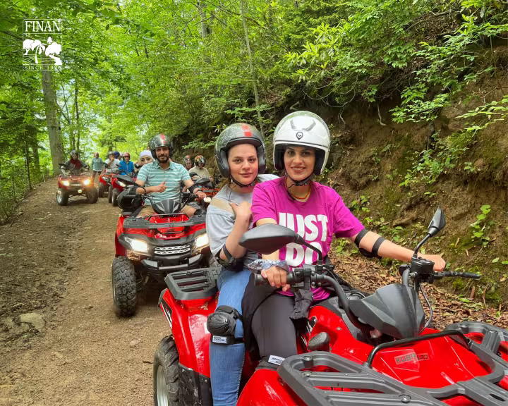 Finan team members riding quad bikes during the company retreat in Trabzon