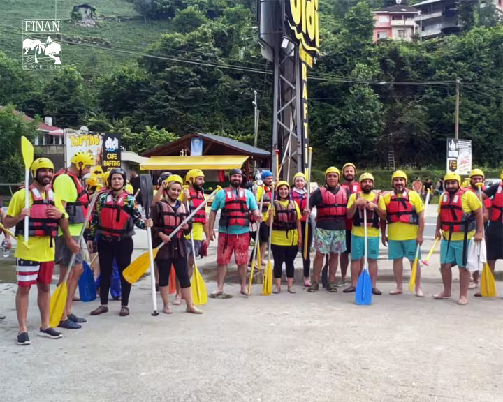 Finan team members in rafting gear during the company retreat in Trabzon
