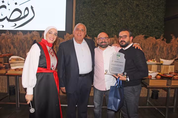 Award recipients with Finan Group representatives at the 2024 Ramadan Iftar