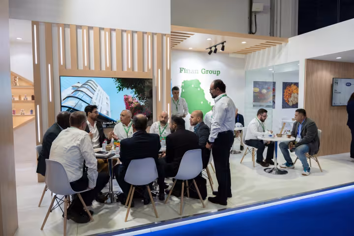 Meetings with visitors in the seating area of the Finan Group stand, Gulfood Manufacturing 2024