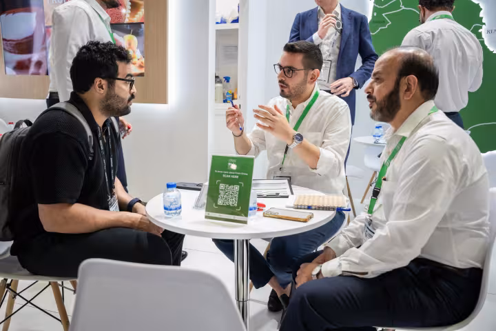 Finan Group team member meeting visitors at the stand, Gulfood Manufacturing 2025