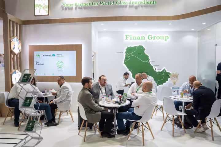 Meetings in the seating area of the Finan Group stand, Gulfood Manufacturing 2025